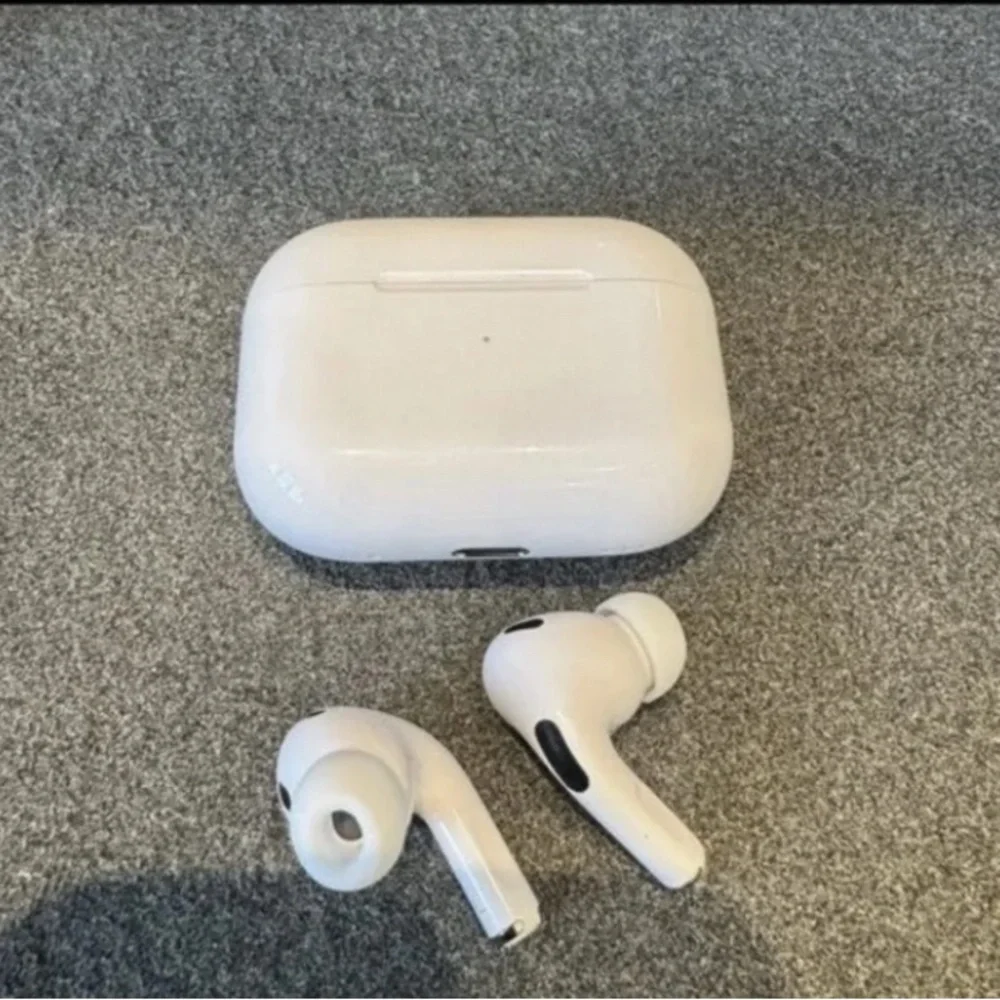 Apple AirPods Pro with White Charging Case and Cable
